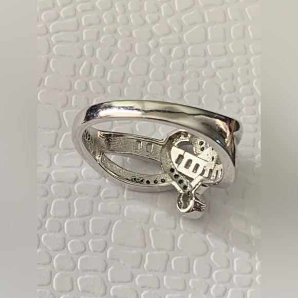 Enhanced Blue Sapphire And Cubic Zirconia Accent Swirled Heart Ring in Sterling - Picture 11 of 13